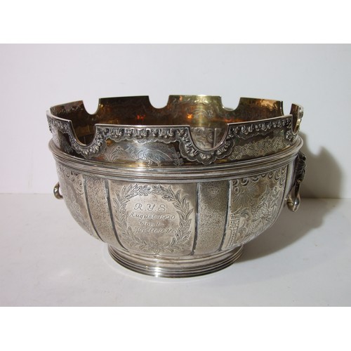 782 - A large silver two-handled punch bowl of circular form  with removeable Monteith collar, on ribbed f... 