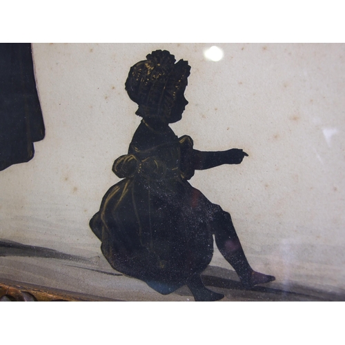 225 - A pair of 19th century silhouettes, family groups, the first depicting a central female figure surro... 