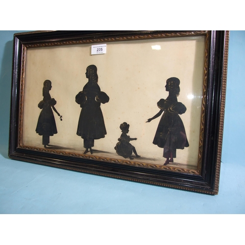 225 - A pair of 19th century silhouettes, family groups, the first depicting a central female figure surro... 