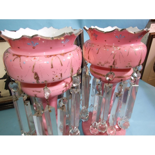 301 - A pair of Victorian pink opaque glass lustre vases with floral enamel and gilt painted decoration an... 