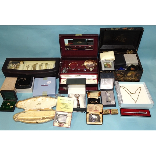 193 - A quantity of costume jewellery and watches, two jewellery cases and one watch case.... 