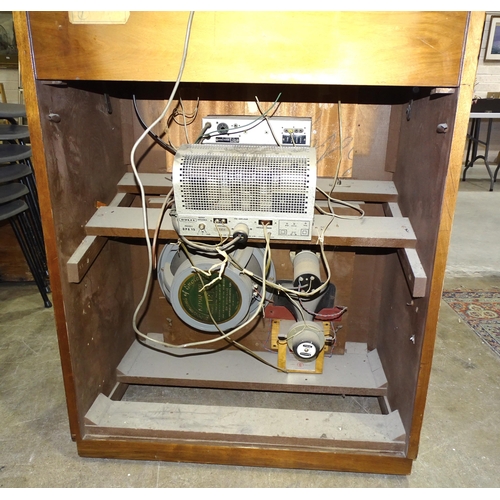 28 - An R.G.D. walnut gramophone cabinet with Garrard AT6 turntable and Dulci DPA 15 amplifier, cabinet 7... 