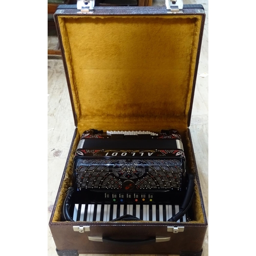 520 - A Fantini Studio Allodi accordion with 34 treble keys and 72 bass, full diamanté decoration on black... 