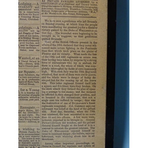 112 - A copy of The Times June 22nd 1815 reporting the Battle of Waterloo, in double-sided frame and two f... 