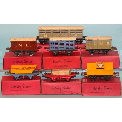 218 - Hornby O gauge, seven 1934-40 boxed wagons: Trinidad Lake, Asphalt, Blue Circle, timber wagon, cattl... 