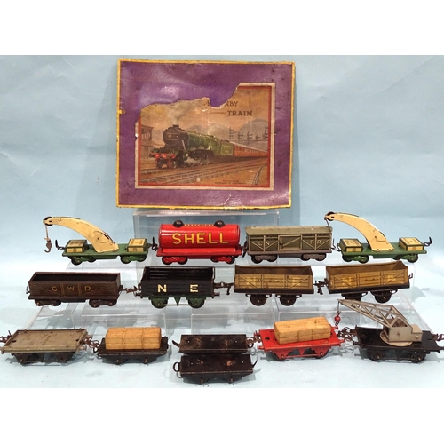 222 - Hornby O gauge, six unboxed pre-war wagons and eight other tinplate wagons, in Hornby train set box,... 