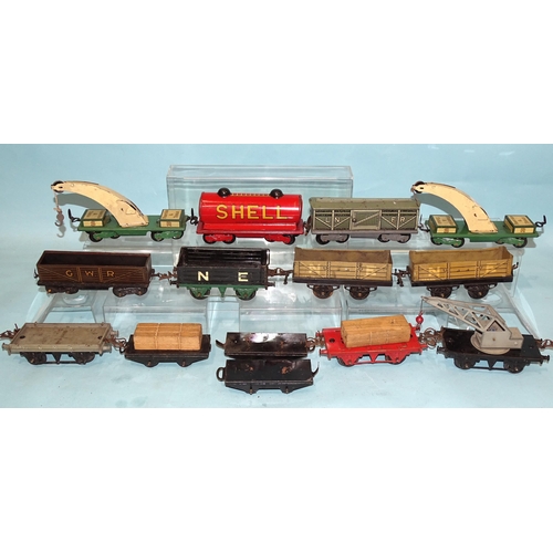 222 - Hornby O gauge, six unboxed pre-war wagons and eight other tinplate wagons, in Hornby train set box,... 