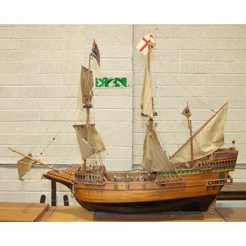 411 - A kit-built wooden model of 'The Mayflower' with full sails, 100cm long, 78cm high.