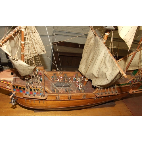 411 - A kit-built wooden model of 'The Mayflower' with full sails, 100cm long, 78cm high.