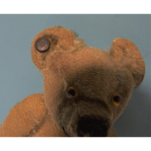 422 - A small early-20th century Chad Valley teddy bear with blank ear button, blonde mohair, replaced gla... 