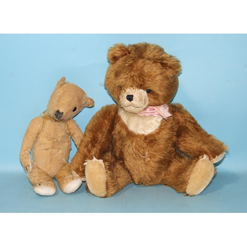 423 - A teddy bear c1930's/40's with one glass eye, nearly bald mohair plush, inoperable squeaker, jointed... 