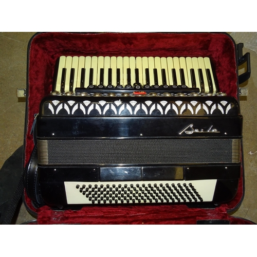 514 - A Baile 120 Bass piano accordion, in case and a modern concertina, in case, (2).