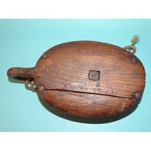 529 - An antique ships pulley block impressed Alan Best Ltd, with twin cast iron roller wheels, 32cm long ... 