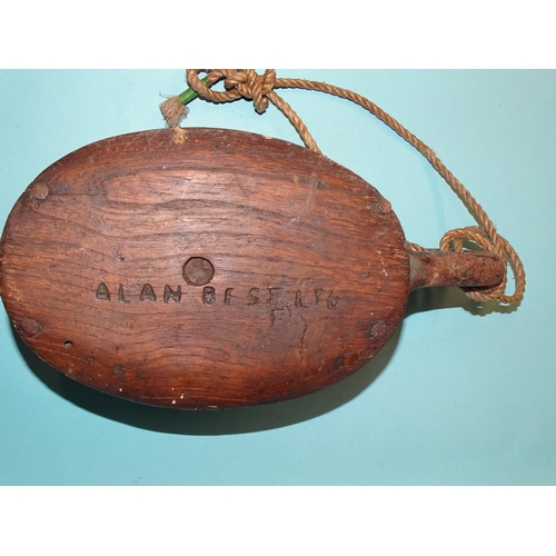 529 - An antique ships pulley block impressed Alan Best Ltd, with twin cast iron roller wheels, 32cm long ... 