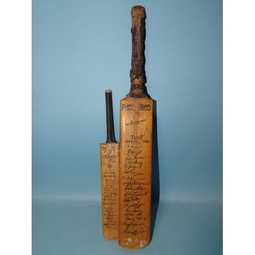 533 - A Sykes Ltd miniature cricket bat with facsimile signatures of Australia 1948, 43.5cm and a Nicholls... 