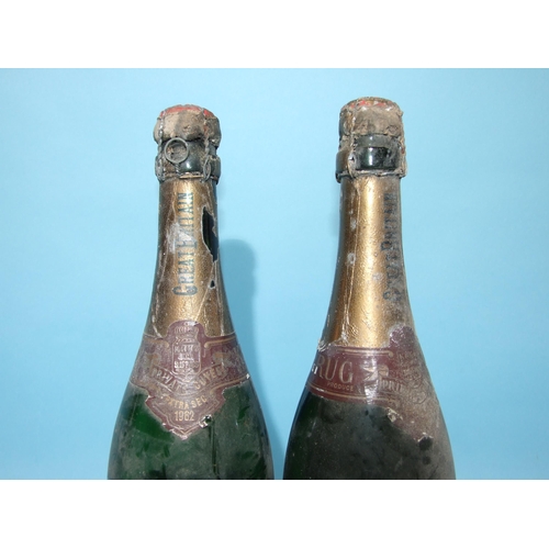 597 - Krug Champagne 1962 Extra Sec, level good, (foil and label damaged), and another, level 50%, (2).... 