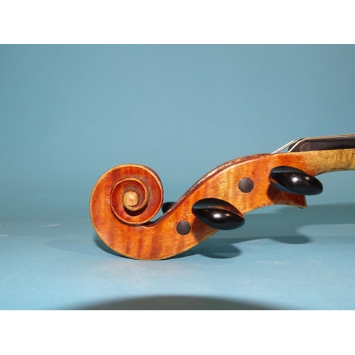 518 - A 20th century ¾-size violin Stradivarius label, with bow, in case.