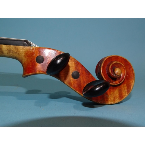 518 - A 20th century ¾-size violin Stradivarius label, with bow, in case.