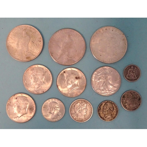 162 - A small collection of USA silver coinage, including 1921 'Morgan' dollar, 2x 1922 'Liberty' dollars,... 