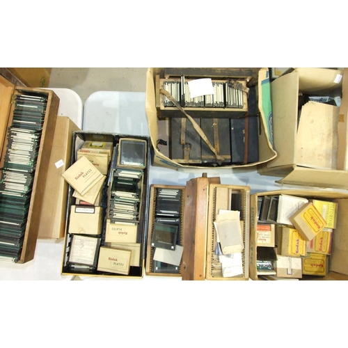 522 - A large quantity of magic lantern slides, photographic glass slides (black and white and colour) and... 