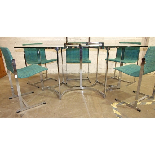 112 - A 1970's plate glass and chrome dining table, the plate glass top with rounded corners, on seven sup... 