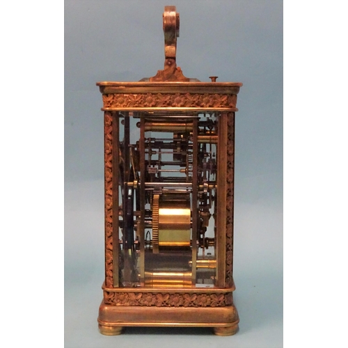 123 - A 19th century French brass repeating carriage clock, the matted and decorative gilt dial with ename... 