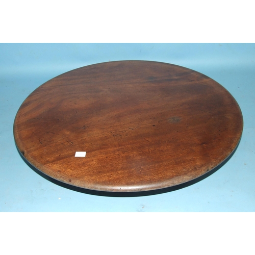 140 - A 19th century mahogany revolving circular serving tray, 68cm diameter, 13cm high.