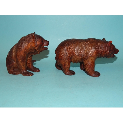 148 - A Black Forest carved wood model of a walking bear, 15 x 8cm high and another of a seated bear, 9.5 ... 