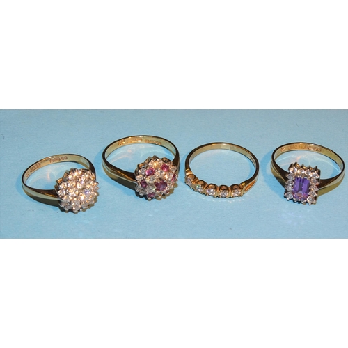 229 - Four 9ct gold rings set synthetic stones, sizes L-P, 8.3g.