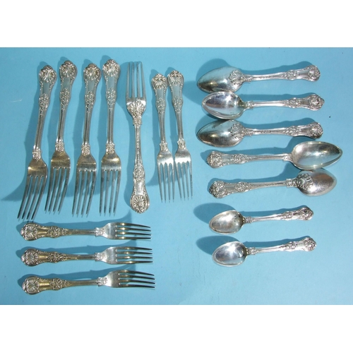 568 - A collection of silver flatware: five each table forks, dessert forks and dessert spoons and two tea... 