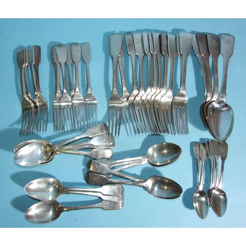 569 - A collection of fiddle pattern flatware: sixteen table forks, twelve dessert spoons, five dessert fo... 