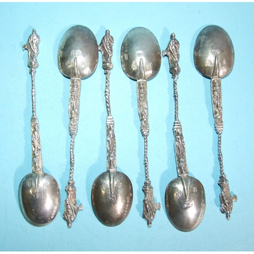 570 - A set of six Continental apostle-type coffee spoons, with import and other marks, ___2.5oz.... 