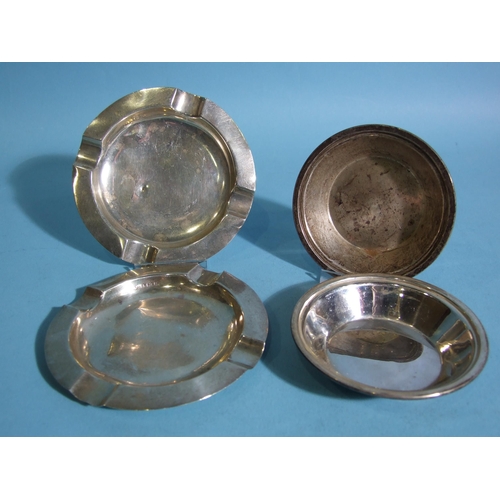 574 - Two small circular dishes, maker Wilson & Gill, Birmingham 1936 and two circular ash trays, 1909... 