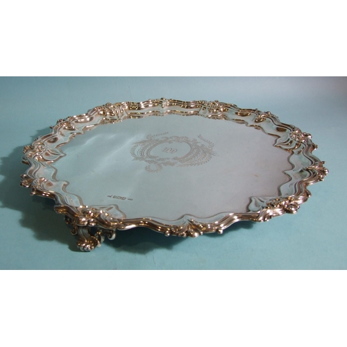 591 - A late-Victorian Walker & Hall silver salver with floral and scroll-work border and engraved ini... 