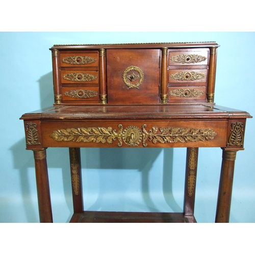 74 - A late-19th century French Empire-style ormolu-mounted ladies' writing desk, the upper part fitted w... 