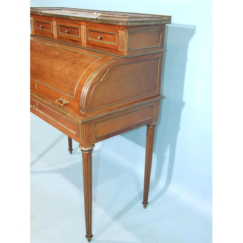 77 - A late-19th/early-20th century French ladies' cylinder bureau with marble galleried top, fitted inte... 