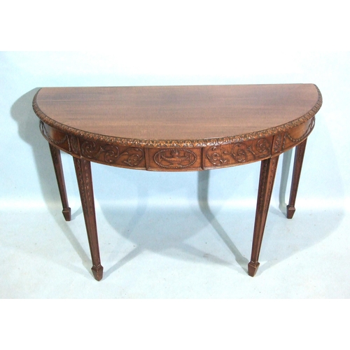 83 - An Adams-style mahogany serpentine serving table of long narrow form, the top with beaded borders ab... 