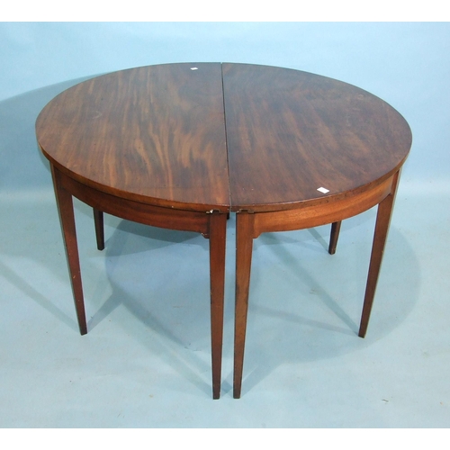 87 - A Georgian mahogany D-end dining table, 123cm diameter extending to 176cm, with one spare leaf.... 