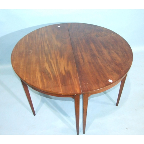 87 - A Georgian mahogany D-end dining table, 123cm diameter extending to 176cm, with one spare leaf.... 