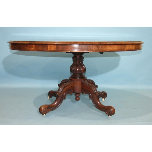 93 - A William IV rosewood breakfast table, the oval top with moulded edge, on well-carved short pillar a... 