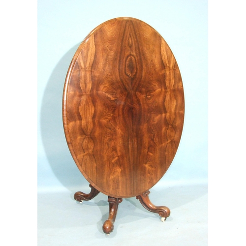 93 - A William IV rosewood breakfast table, the oval top with moulded edge, on well-carved short pillar a... 