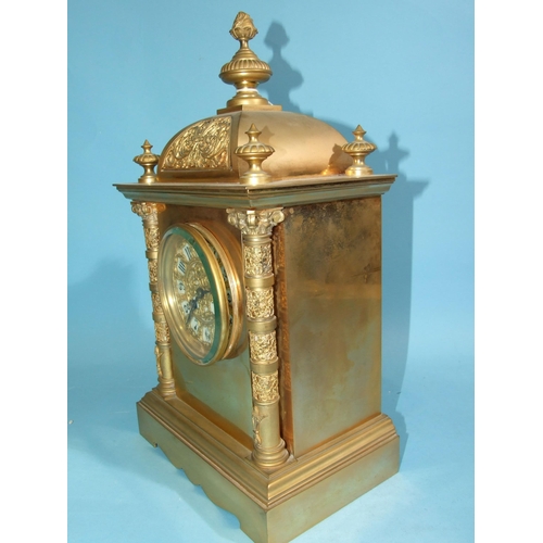 122 - A 19th century gilt metal mantel clock of architectural form, the domed case with decorative Corinth... 