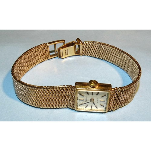 178 - Tissot, a ladies 9ct yellow gold wristwatch, 1969, the rectangular silvered dial with baton numerals... 