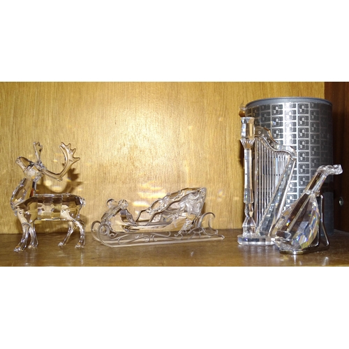 108 - Swarovski, 'Reindeer and sleigh', 'Lute' and 'Harp', (unboxed), (4).