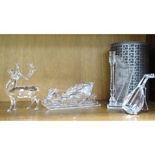 108 - Swarovski, 'Reindeer and sleigh', 'Lute' and 'Harp', (unboxed), (4).