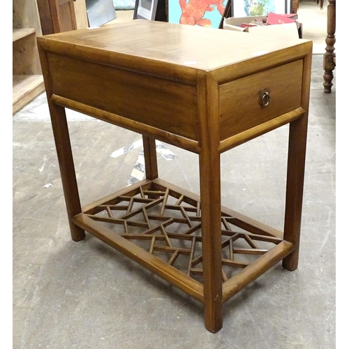 13 - A modern stained wood table fitted with end drawers, on square legs united by a pierced undertier, 6... 