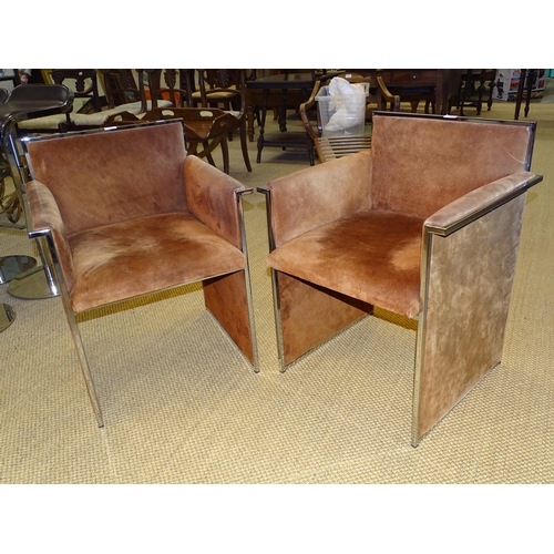 2 - A pair of brown suede-upholstered chrome armchairs, (some fading and discolouration), (2).... 