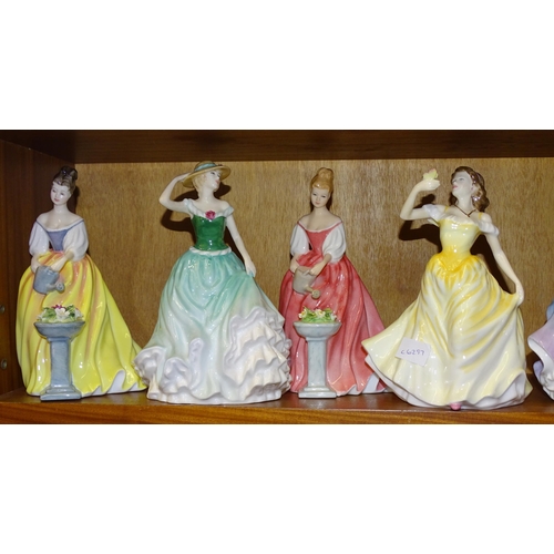 87 - A collection of seven Royal Doulton figurines: 'Nicole' HN4112, 'First Waltz' HN2862, 'Madeline' HN4... 