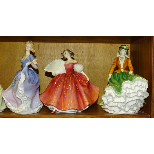 87 - A collection of seven Royal Doulton figurines: 'Nicole' HN4112, 'First Waltz' HN2862, 'Madeline' HN4... 