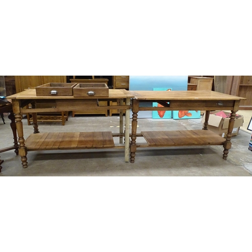 71 - A modern stained wood kitchen centre work table with four through-sliding drawers, the two-part top ... 